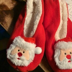 Red Santa Slippers with White Trim unsure of size S/M